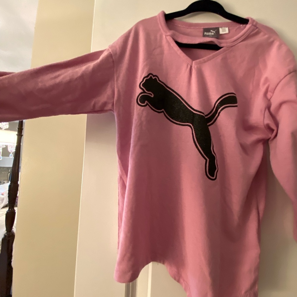Pink/ plum puma top size 8. Top has a knot in front. Great for activities.